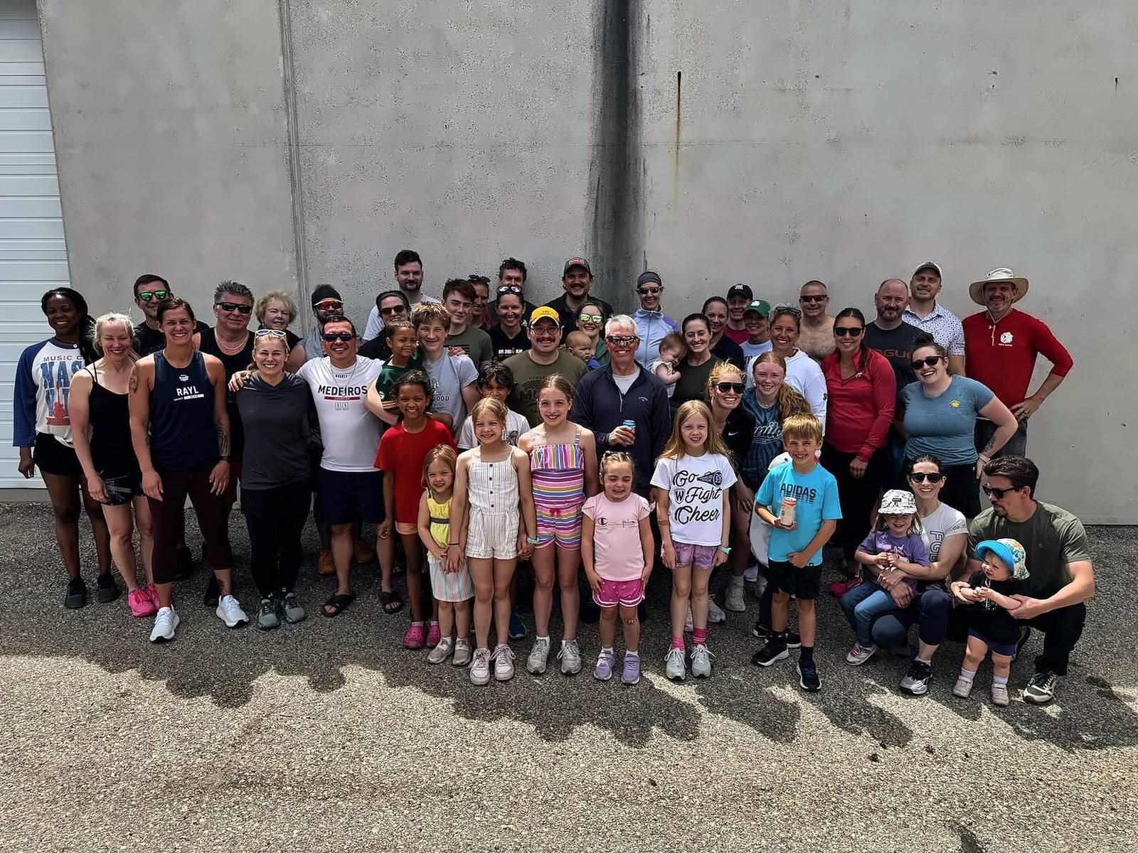 The MadCity community, adults and kids together, after the Memorial Day Murph workout