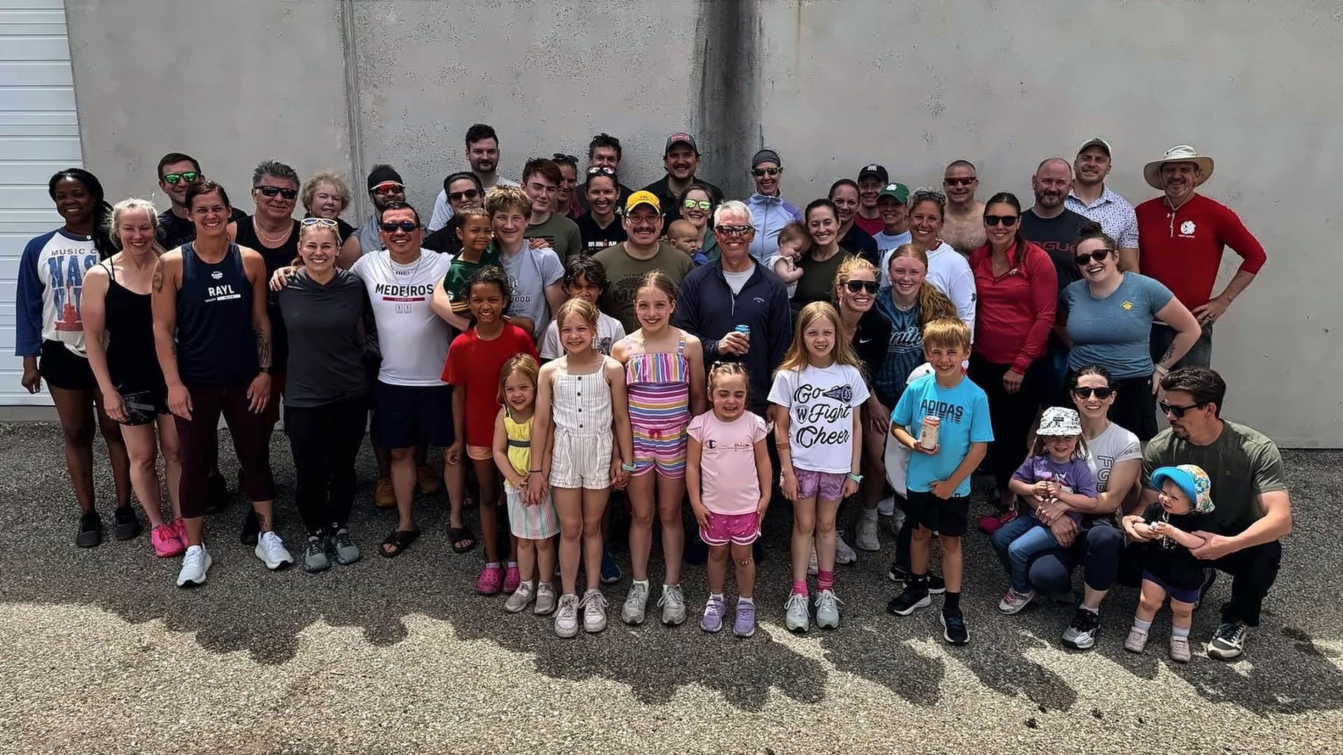 The MadCity community, adults and kids together, after the Memorial Day Murph workout